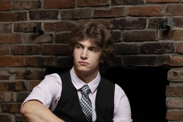 Commercial studio lighting by Back to Dust Studios: Male fashion model and high-impact brand advertisement photography.